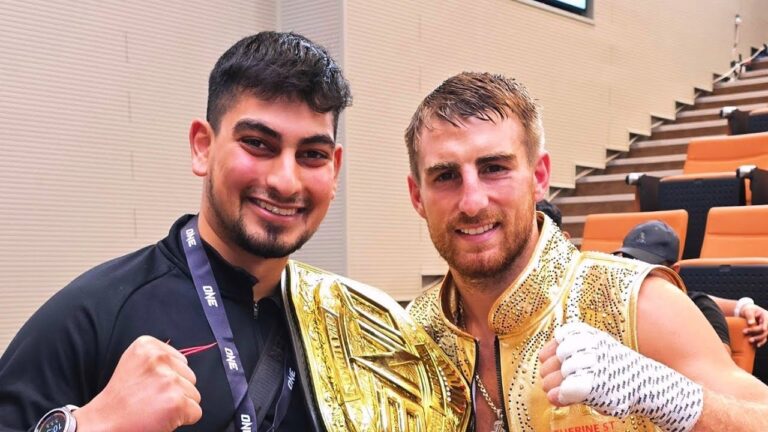 Holding A World Title Belt