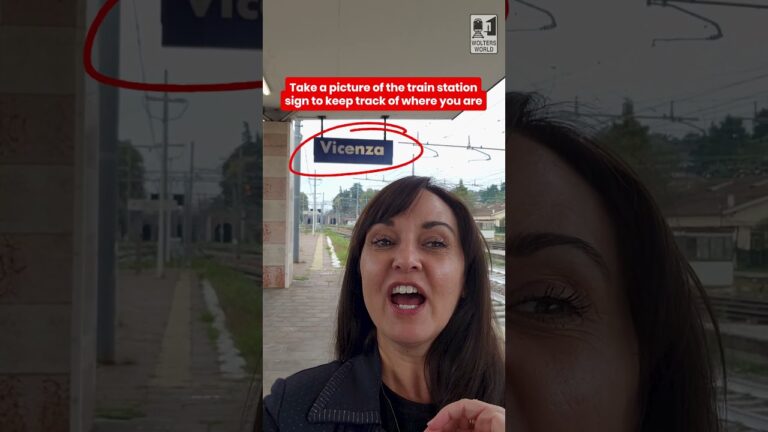 Take a picture of the train station sign to keep track of where you are